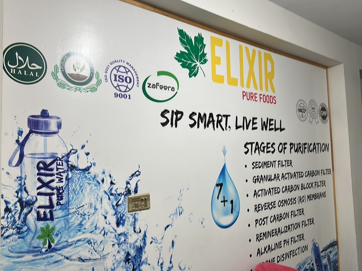 Elixir Pure Foods facility branding and purification process display